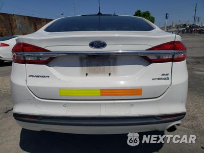 Zdjęcie 6 z 13 samochodu: 2018 FORD FUSION SE HYBRID VIN:3FA6P0LU5JR172116 - miniatura