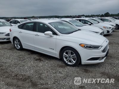 Czwarte zdjęcie samochodu z boku: 2018 FORD FUSION SE HYBRID VIN:3FA6P0LU5JR171841 - miniatura