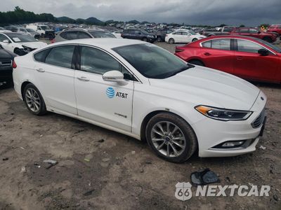 Czwarte zdjęcie samochodu z boku: 2017 FORD FUSION SE HYBRID VIN:3FA6P0LU4HR409513 - miniatura