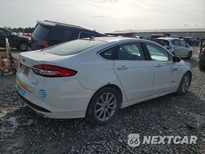 Trzecie zdjęcie samochodu z tyłu: 2017 FORD FUSION SE HYBRID VIN:3FA6P0LU3HR409518 - miniatura