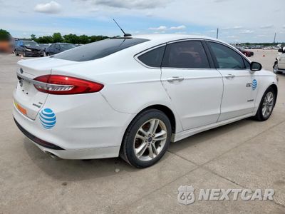 Trzecie zdjęcie samochodu z tyłu: 2017 FORD FUSION SE HYBRID VIN:3FA6P0LU0HR409217 - miniatura