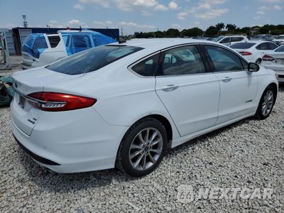 Trzecie zdjęcie samochodu z tyłu: 2017 FORD FUSION SE HYBRID VIN:3FA6P0LU5HR409570 - miniatura