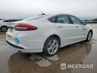 Trzecie zdjęcie samochodu z tyłu: 2018 FORD FUSION SE HYBRID VIN:3FA6P0LU7JR118591 - miniatura