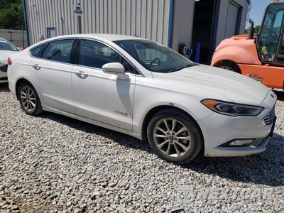 Czwarte zdjęcie samochodu z boku: 2017 FORD FUSION SE HYBRID VIN:3FA6P0LU2HR409493 - miniatura