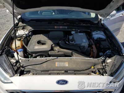 Zdjęcie 11 z 12 samochodu: 2017 FORD FUSION SE HYBRID VIN:3FA6P0LU8HR359537 - miniatura