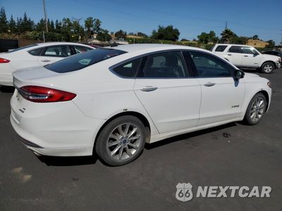 Trzecie zdjęcie samochodu z tyłu: 2017 FORD FUSION SE HYBRID VIN:3FA6P0LU1HR408898 - miniatura