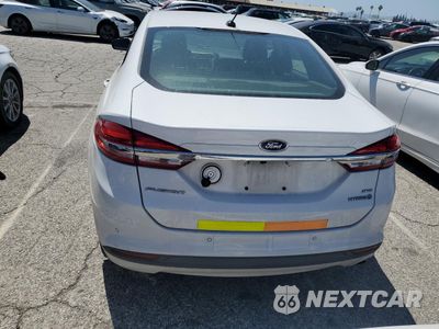 Zdjęcie 6 z 12 samochodu: 2017 FORD FUSION SE HYBRID VIN:3FA6P0LU0HR409685 - miniatura
