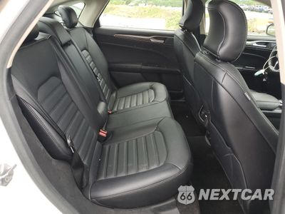 Zdjęcie 10 z 12 samochodu: 2018 FORD FUSION SE HYBRID VIN:3FA6P0LU3JR129944 - miniatura