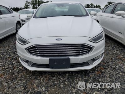 Piąte zdjęcie samochodu w środku: 2017 FORD FUSION SE HYBRID VIN:3FA6P0LUXHR409273 - miniatura