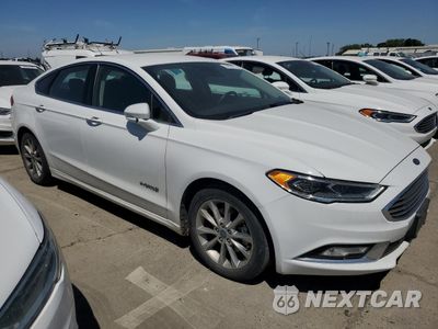 Czwarte zdjęcie samochodu z boku: 2017 FORD FUSION SE HYBRID VIN:3FA6P0LU7HR409439 - miniatura