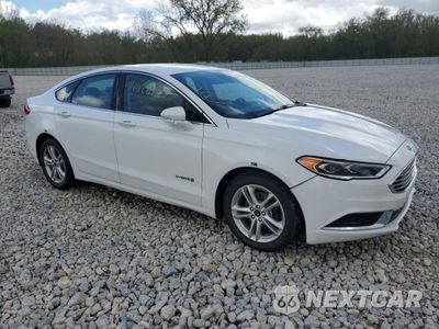 Czwarte zdjęcie samochodu z boku: 2018 FORD FUSION SE HYBRID VIN:3FA6P0LU8JR281928 - miniatura