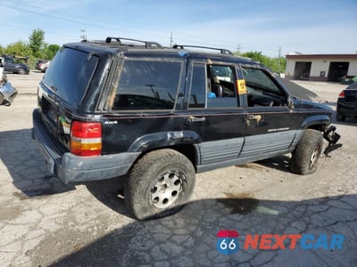 Trzecie zdjęcie samochodu z tyłu: 1997 JEEP GRAND CHEROKEE LAREDO VIN:1J4GZ58S1VC707714 - miniatura