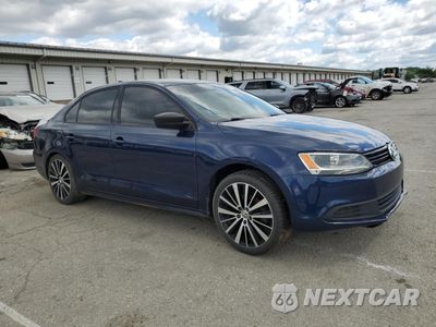 Czwarte zdjęcie samochodu z boku: 2014 VOLKSWAGEN JETTA BASE VIN:3VW1K7AJ7EM408723 - miniatura