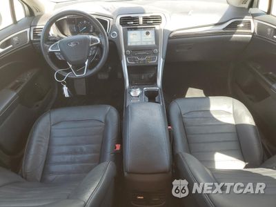 Zdjęcie 8 z 13 samochodu: 2017 FORD FUSION SE HYBRID VIN:3FA6P0LU9HR409121 - miniatura