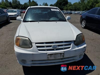 Piąte zdjęcie samochodu w środku: 2005 HYUNDAI ACCENT GS VIN:KMHCG35C75U353506 - miniatura