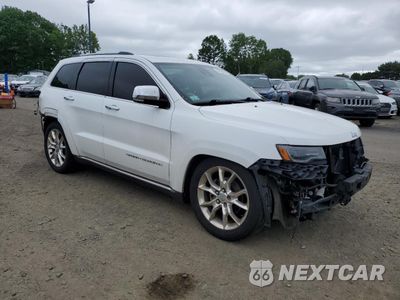Czwarte zdjęcie samochodu z boku: 2014 JEEP GRAND CHEROKEE SUMMIT VIN:1C4RJFJG0EC237659 - miniatura
