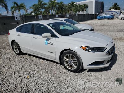Czwarte zdjęcie samochodu z boku: 2018 FORD FUSION SE HYBRID VIN:3FA6P0LU3JR278709 - miniatura
