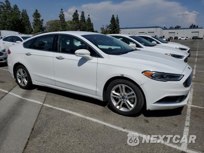 Czwarte zdjęcie samochodu z boku: 2018 FORD FUSION SE HYBRID VIN:3FA6P0LU5JR278632 - miniatura