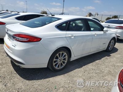 Trzecie zdjęcie samochodu z tyłu: 2017 FORD FUSION SE HYBRID VIN:3FA6P0LU7HR410106 - miniatura
