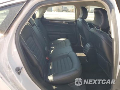Zdjęcie 10 z 12 samochodu: 2018 FORD FUSION SE HYBRID VIN:3FA6P0LU7JR118865 - miniatura