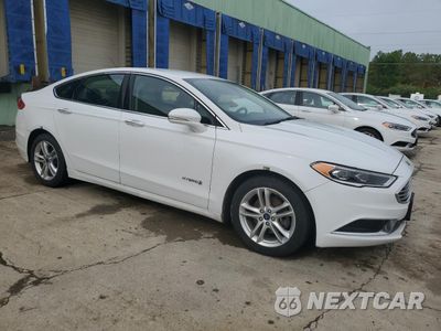 Czwarte zdjęcie samochodu z boku: 2018 FORD FUSION SE HYBRID VIN:3FA6P0LU8JR172028 - miniatura