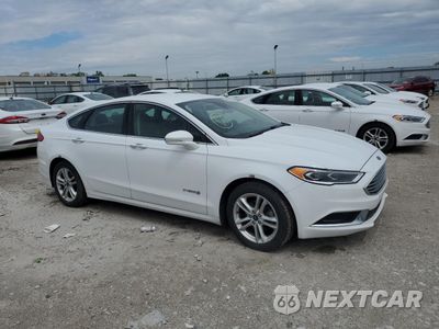 Czwarte zdjęcie samochodu z boku: 2018 FORD FUSION SE HYBRID VIN:3FA6P0LU2JR172090 - miniatura