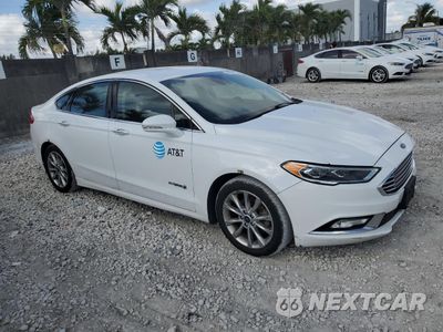 Czwarte zdjęcie samochodu z boku: 2017 FORD FUSION SE HYBRID VIN:3FA6P0LU1HR359590 - miniatura
