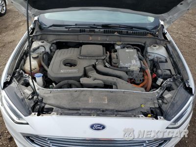 Zdjęcie 11 z 13 samochodu: 2018 FORD FUSION SE HYBRID VIN:3FA6P0LU7JR172084 - miniatura