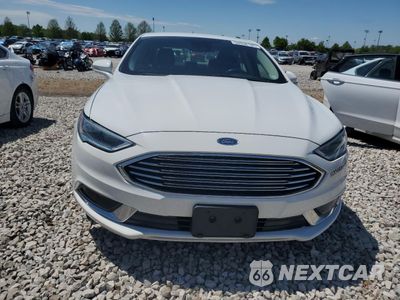 Piąte zdjęcie samochodu w środku: 2018 FORD FUSION SE HYBRID VIN:3FA6P0LU9JR118611 - miniatura