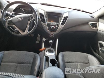 Zdjęcie 8 z 12 samochodu: 2013 HYUNDAI VELOSTER VIN:KMHTC6AD4DU169831 - miniatura