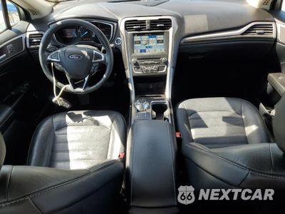 Zdjęcie 8 z 12 samochodu: 2017 FORD FUSION SE HYBRID VIN:3FA6P0LU8HR408963 - miniatura