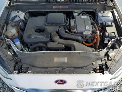 Zdjęcie 11 z 12 samochodu: 2017 FORD FUSION SE HYBRID VIN:3FA6P0LUXHR359538 - miniatura