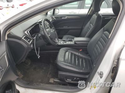 Zdjęcie 7 z 12 samochodu: 2017 FORD FUSION SE HYBRID VIN:3FA6P0LU1HR409274 - miniatura
