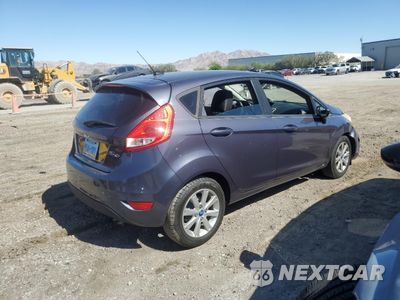 Trzecie zdjęcie samochodu z tyłu: 2012 FORD FIESTA SE VIN:3FADP4EJ2CM183088 - miniatura