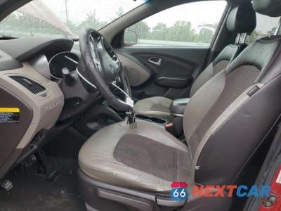 Zdjęcie 7 z 14 samochodu: 2012 HYUNDAI TUCSON GLS VIN:KM8JUCAC8CU529630 - miniatura