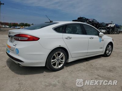 Trzecie zdjęcie samochodu z tyłu: 2018 FORD FUSION SE HYBRID VIN:3FA6P0LU8JR118776 - miniatura