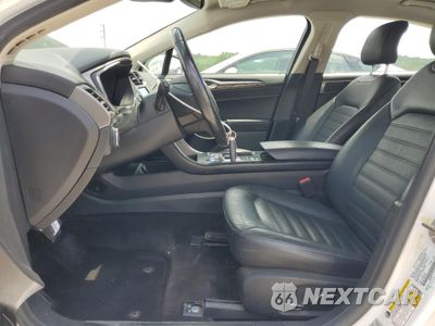 Zdjęcie 7 z 12 samochodu: 2018 FORD FUSION SE HYBRID VIN:3FA6P0LU2JR171943 - miniatura