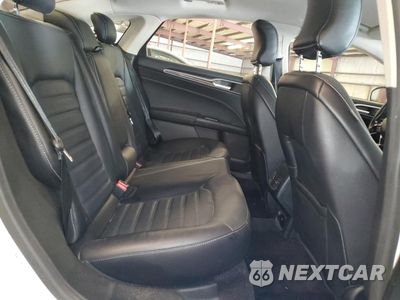 Zdjęcie 10 z 12 samochodu: 2017 FORD FUSION SE HYBRID VIN:3FA6P0LUXHR359586 - miniatura