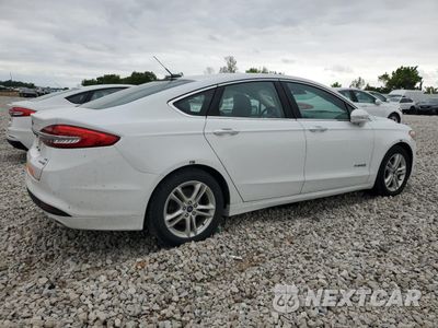 Trzecie zdjęcie samochodu z tyłu: 2018 FORD FUSION SE HYBRID VIN:3FA6P0LU6JR171864 - miniatura