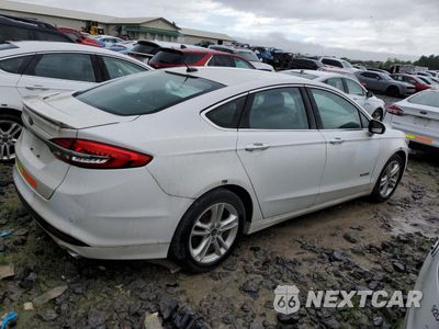Trzecie zdjęcie samochodu z tyłu: 2018 FORD FUSION SE HYBRID VIN:3FA6P0LU2JR278717 - miniatura