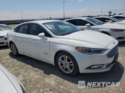 Czwarte zdjęcie samochodu z boku: 2017 FORD FUSION SE HYBRID VIN:3FA6P0LU7HR410106 - miniatura