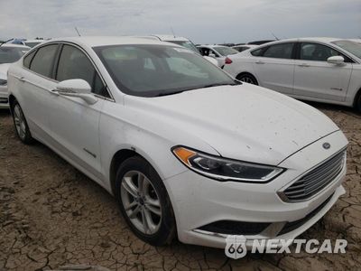 Czwarte zdjęcie samochodu z boku: 2018 FORD FUSION SE HYBRID VIN:3FA6P0LU9JR172068 - miniatura