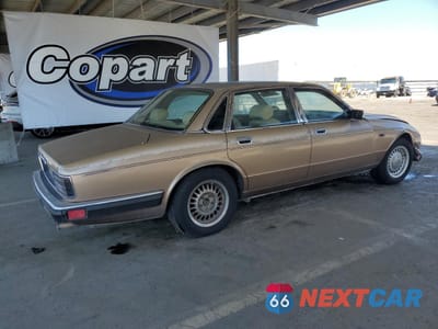 Trzecie zdjęcie samochodu z tyłu: 1990 JAGUAR VANDENPLAS VIN:SAJKY1747LC613849 - miniatura