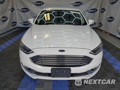 Piąte zdjęcie samochodu w środku: 2017 FORD FUSION SE HYBRID VIN:3FA6P0LU4HR409611 - miniatura