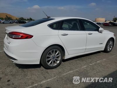 Trzecie zdjęcie samochodu z tyłu: 2017 FORD FUSION SE HYBRID VIN:3FA6P0LU7HR409747 - miniatura