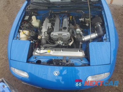 Zdjęcie 11 z 12 samochodu: 1990 MAZDA MX-5 MIATA VIN:JM1NA3514L0102198 - miniatura