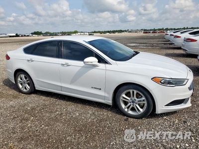 Czwarte zdjęcie samochodu z boku: 2018 FORD FUSION SE HYBRID VIN:3FA6P0LUXJR171690 - miniatura