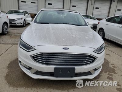 Piąte zdjęcie samochodu w środku: 2017 FORD FUSION SE HYBRID VIN:3FA6P0LU2HR400745 - miniatura