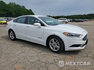 Czwarte zdjęcie samochodu z boku: 2018 FORD FUSION SE HYBRID VIN:3FA6P0LU5JR278744 - miniatura