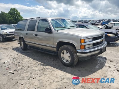 Czwarte zdjęcie samochodu z boku: 1999 CHEVROLET SUBURBAN K1500 VIN:3GNFK16R4XG271981 - miniatura